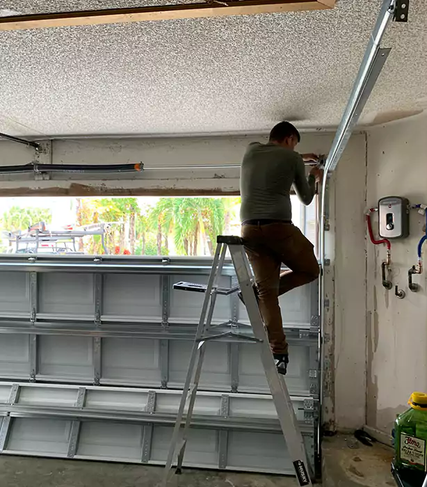 Garage Door Hinge Replacement in Atlantis, FL